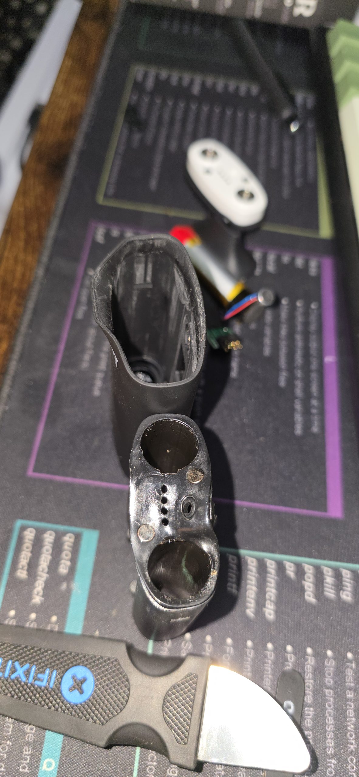 A side-by-side of the outer shell and the internal chassis. The heat deformed the outer plastic so badly that reassembly was impossible.