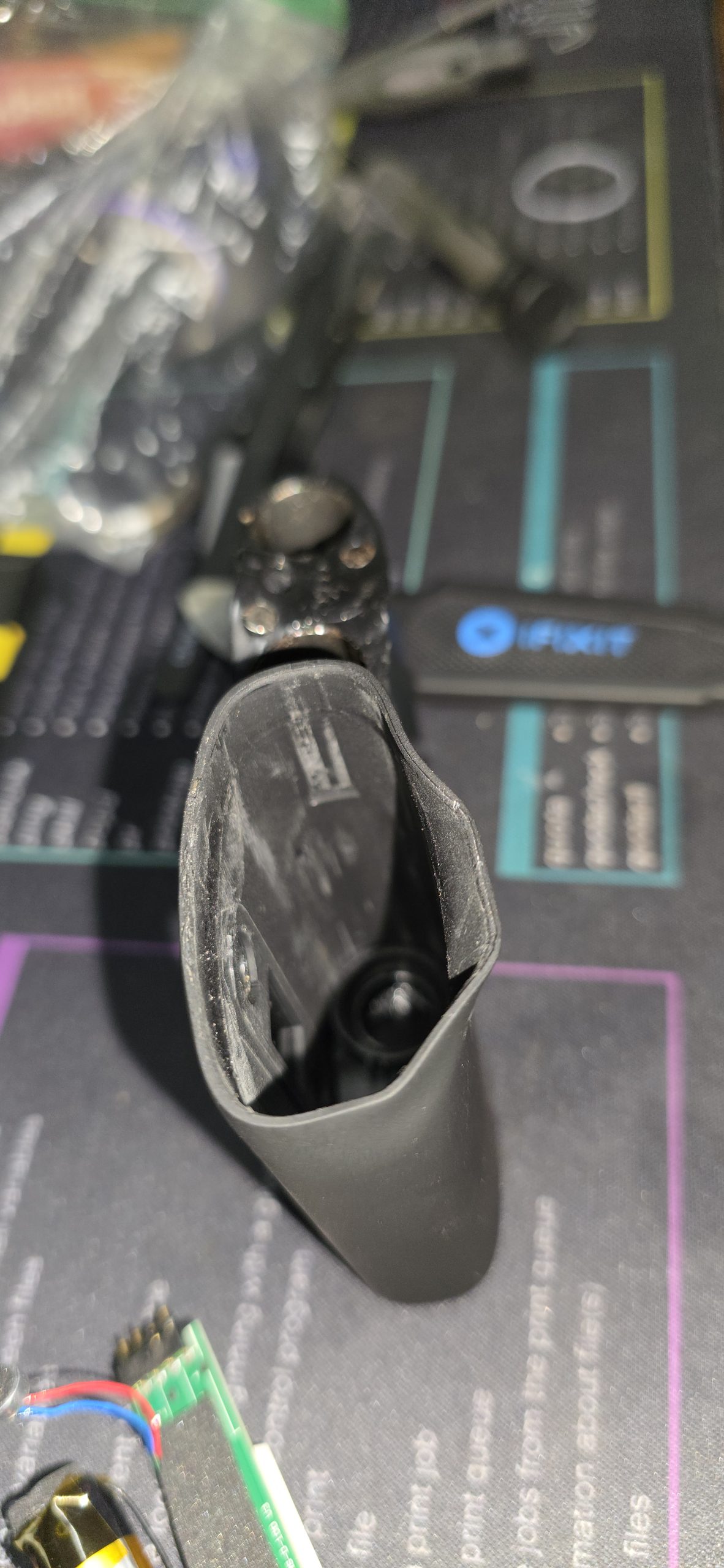 A side-by-side of the outer shell and the internal chassis. The heat deformed the outer plastic so badly that reassembly was impossible.