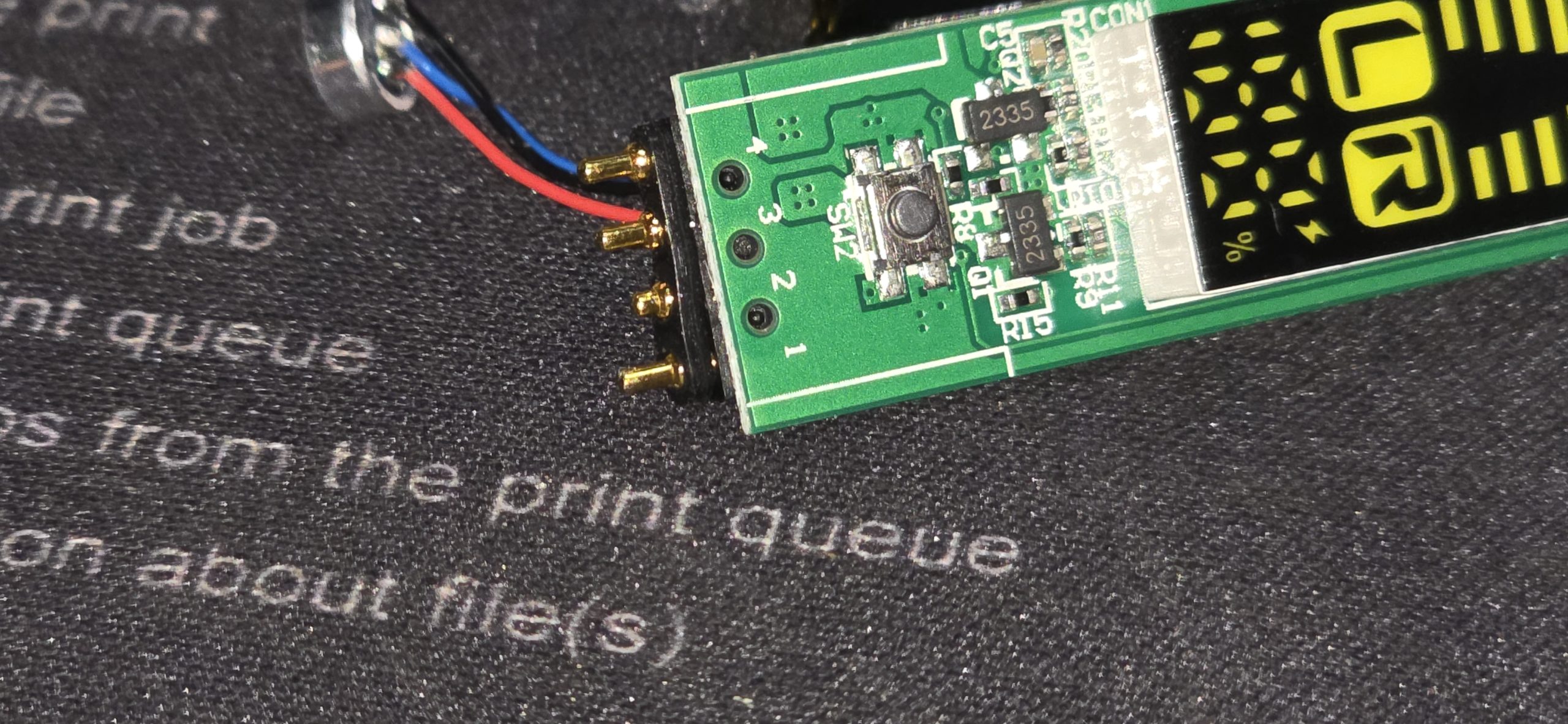 A look at the internal circuitry. You can see the pogo pins on the left and the small display screen. These pins seem to be the weak link that limits the device's lifespan.